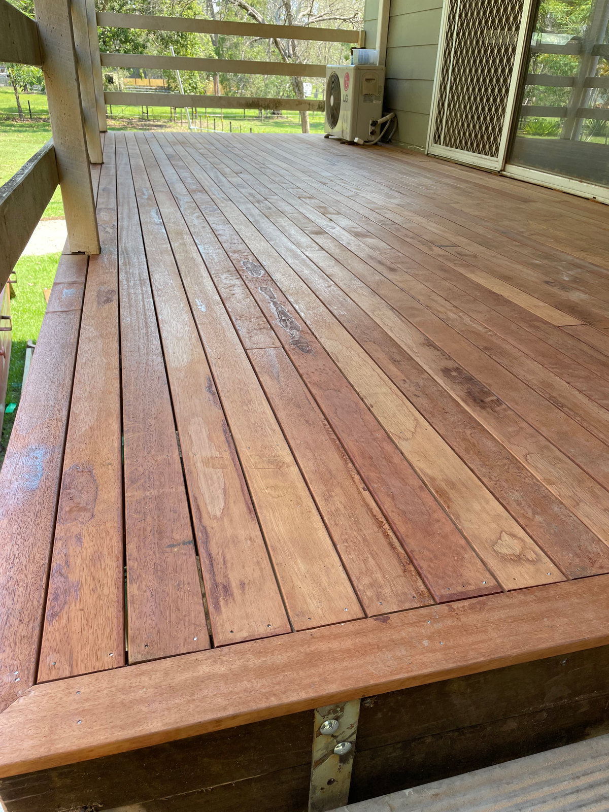 Finished hardwood deck with picture-frame edge