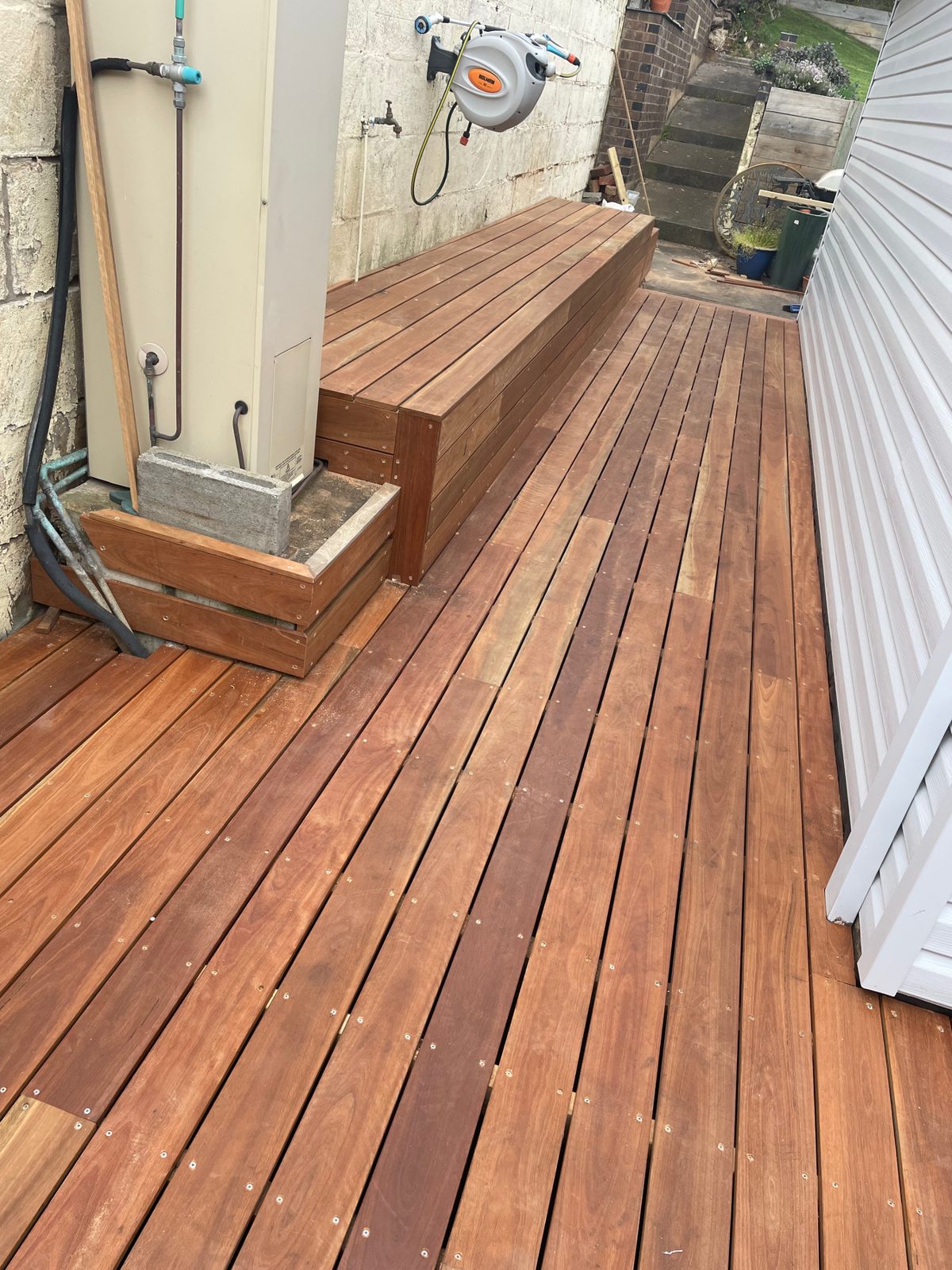 Hardwood deck with built-in timber bench seat